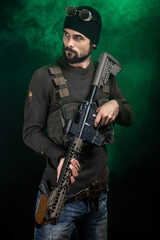 Fototapeta premium A man with a weapon. Post-apocalyptic hero