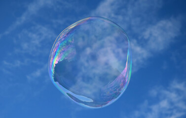 Soap bubble flying in a sunny day