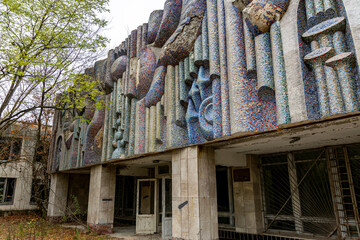 Abandoned crumbling buildings with Soviet-era mosaics in the Chernobyl exclusion zone.