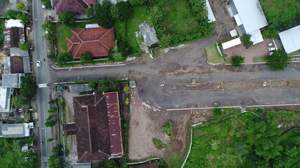 Residential road area taken using a drone. Beautiful streets that look comfortable to use for morning jogging or casual sports or just for a leisurely walk with family.