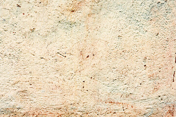 Texture of a concrete wall with cracks and scratches which can be used as a background