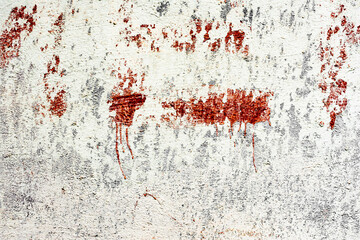 Texture of a concrete wall with cracks and scratches which can be used as a background