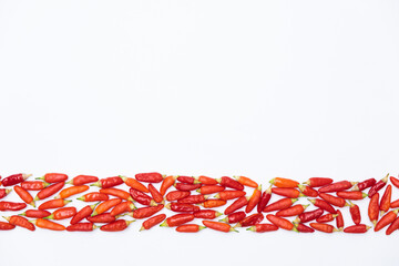 Thick border with red hot peppers. White backpground, Space for text