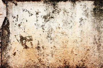 Texture of a concrete wall with cracks and scratches which can be used as a background