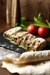 Pita dish with grilled meat and vegetables
