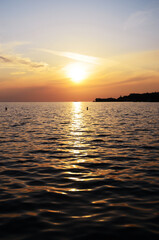 Background of beautiful view on red sunset at the Adriatic seaside. Portorož, Slovenia. Traveling concept. 