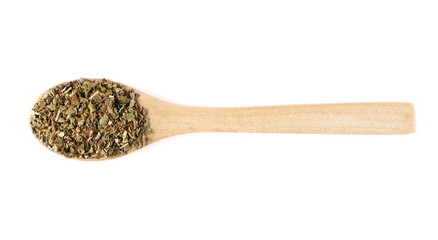 Basil dried spice in wooden spoon isolated on white background, top view