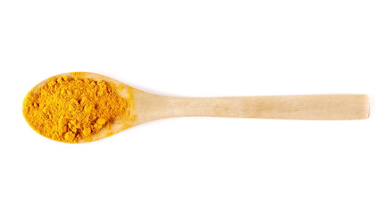 Turmeric (Curcuma) powder pile in wooden spoon isolated on white background, top view