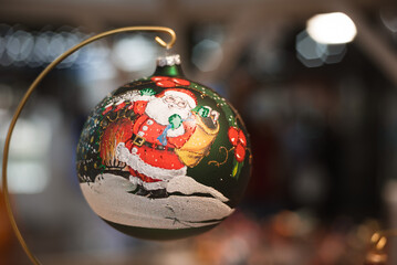 Christmas bauble with painted Santa Claus