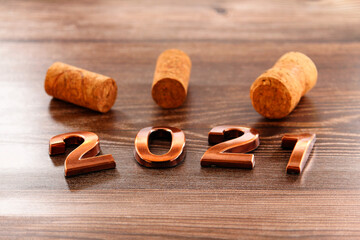 Happy New Year. The number 2021 on brown background.
