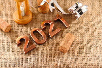 Happy New Year. The number 2021 on brown background.
