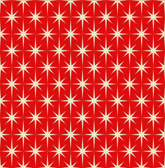 Mid-century modern wrapping paper with starburst pattern with cream stars on red background