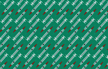 Repeating pattern of medical syringes on green background.