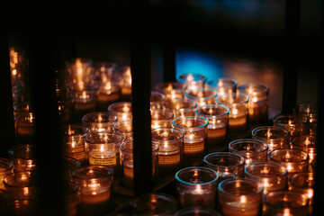 Candles sitting on a rack