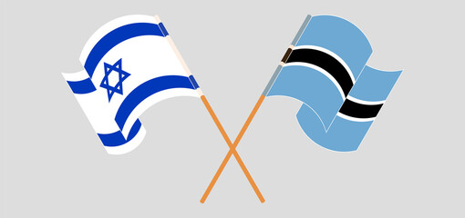 Crossed and waving flags of Israel and Botswana