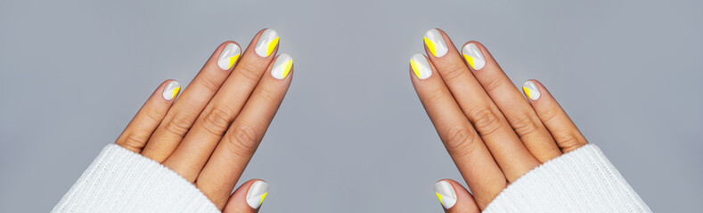 Banner made with perfect minimalistic manicure with geometry in trendy colors of year 2021.