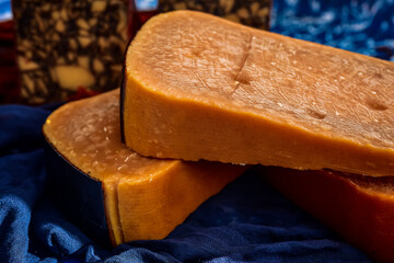 close up detail of stacked wedges of aged gouda gourmet cheese from The Netherlands
