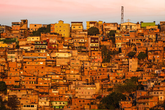 Front view of a favela at sunset