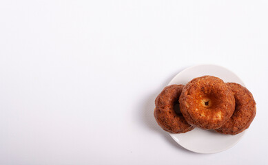 Cupcakes made from flour, eggs, ricotta cheese, sugar. On a white background with space for text....