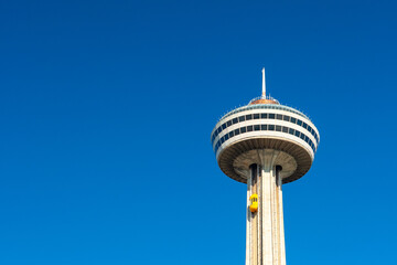 The Skylon tower in Niagara Falls, Ontario, Canada, against clear blue sky