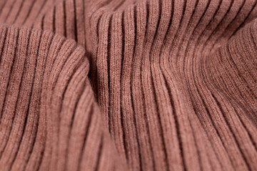 beige knitted fabric laid in waves