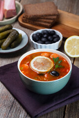 Solyanka, Russian soup with sausage, olives and capers