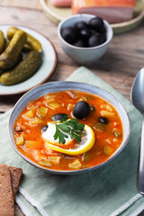 Solyanka, Russian soup with sausage, olives and capers