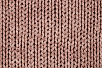 Large rhythmic pattern of light knitted material from woolen threads