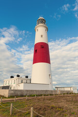 Portland Bill Lighthouse. Dorset coast in Isle of Portland, UK. A sea way-mark guiding vessels navigating in the English Channel.