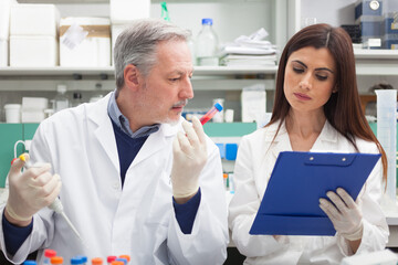 Couple of scientists at work in a laboratory