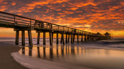 Fototapeta premium sunset on the pier. Coastal dream. Travel concept.