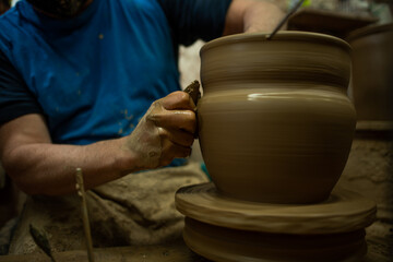 Handmade clay pot made by hand on manual lathe