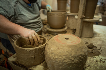 Handmade clay pot made by hand on manual lathe