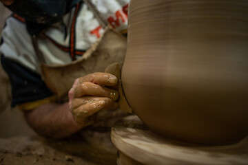 Handmade clay pot made by hand on manual lathe