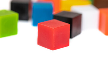 Close up shot of colorful plastic blocks on white background
