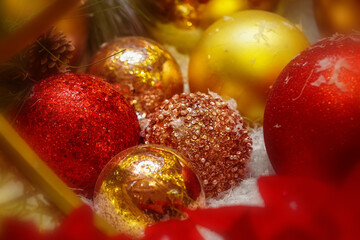 Fototapeta na wymiar Close up shot of colorful ornaments at Christmas tree décor 