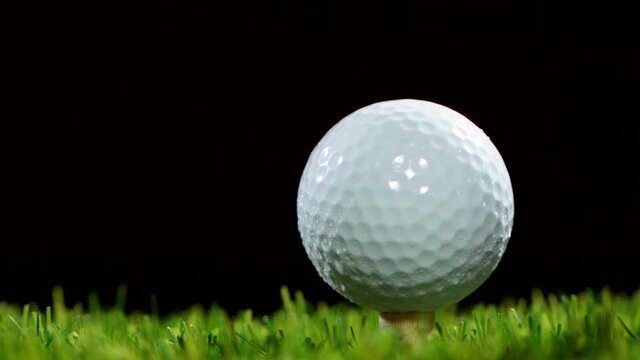 Super slow motion of hitting golfball in detail. Filmed on high speed cinema camera, 1000fps.