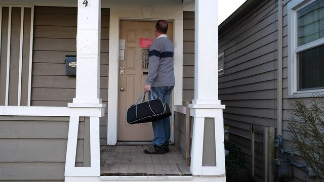 Man arrives home to find an eviction notice posted to his front door, worried about what to do next