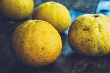 Citrus medica Linn on wood table. Asian tropical fruit.