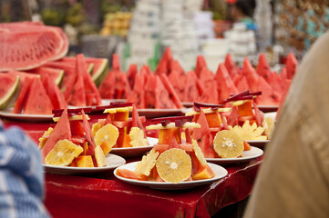 Fruit sets on thr white plates for the party 