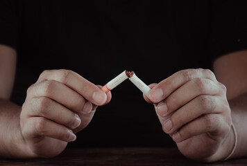 hand holding cigarette