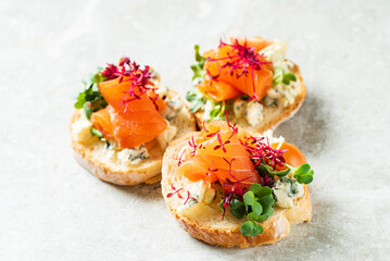 canape with salted salmon and herbs