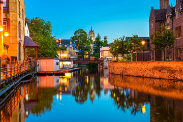 Fototapeta na wymiar Cambridge city water canal near Magdalene street at dusk. England 