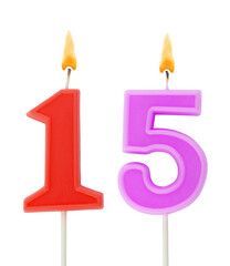 Burning birthday candles isolated on white background, number 15