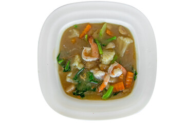Die cut of Noodles with seafood and shrimp in Gravy Sauce on white isolated.