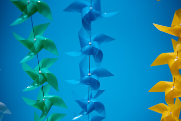 Colorful pinwheel on blur background