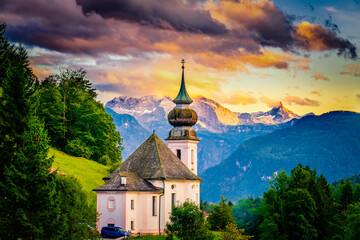 Fototapeta premium Maria Gern church at sunset with famous Watzmann summit in the background. Berchtesgadener Land in Bavaria, Germany