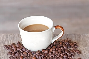 cup of coffee with beans