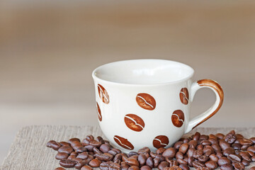 cup of coffee with beans