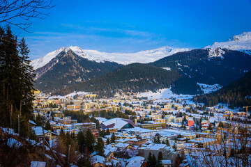 Fototapeta na wymiar Winter Landscape of famous Alpine ski resort DAVOS, SWITZERLAND.
